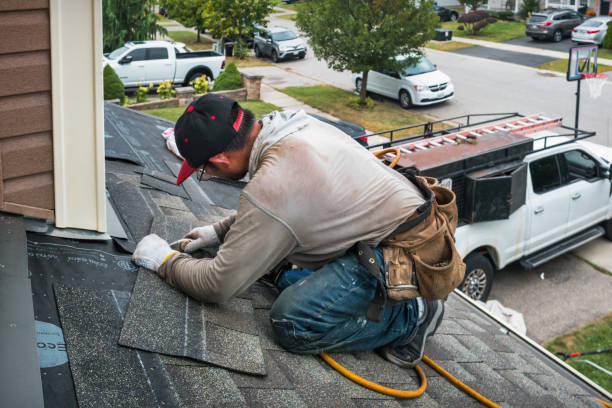 Professional Gutter Repair And Installation technician working in Broadview, MT